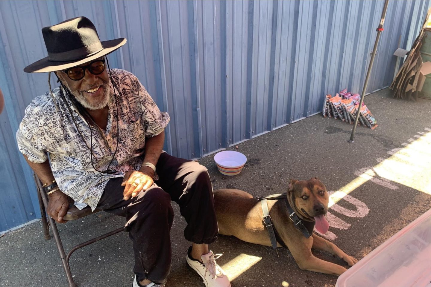 Dog and owner smiling at camera